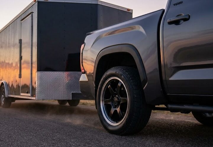 2022 Toyota Tundra TRD Pro towing a heavy trailer, utilizing New Toyota Hub Rings for a stable, vibration-free ride.