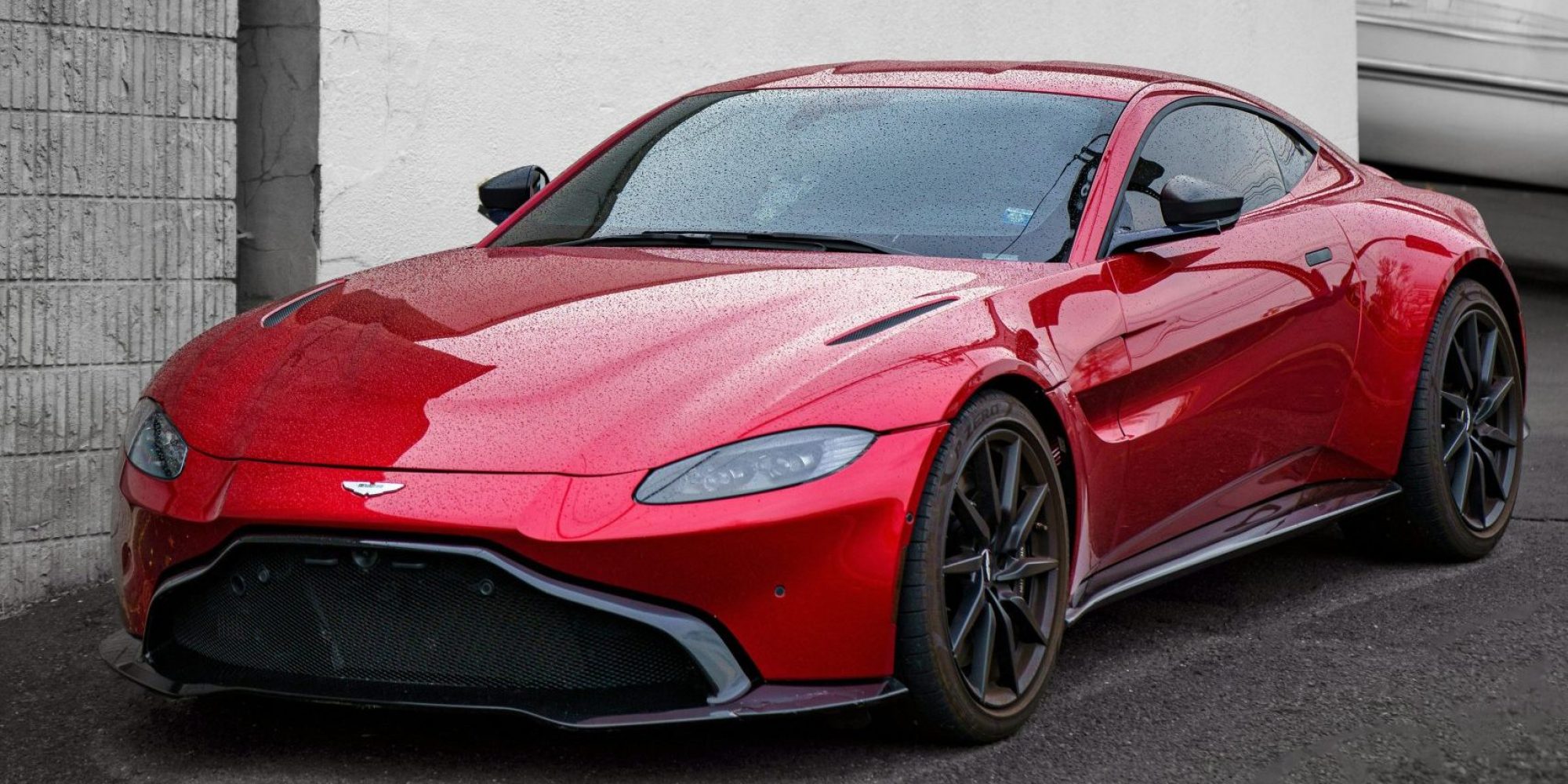 A sleek red Aston Martin. Aston Martin Wheel Spacers / Adapters