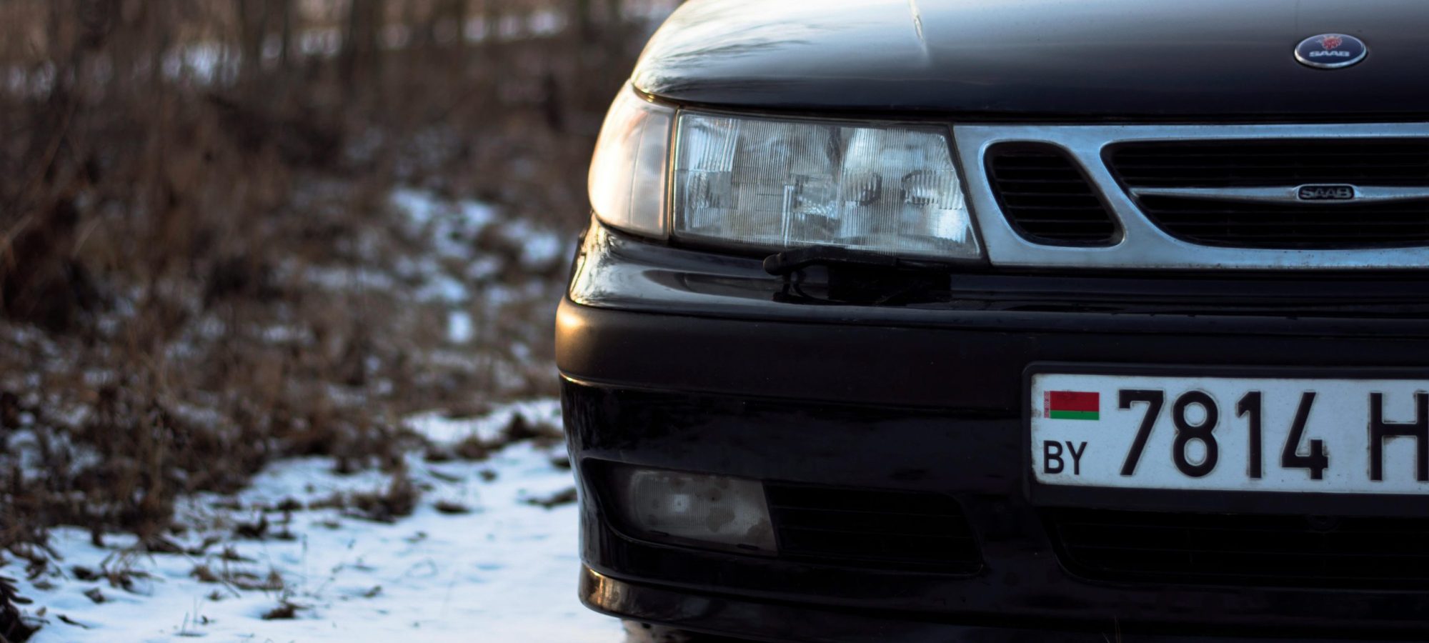 Close-up of a black SAAB by Vitali Adutskevich via pexels