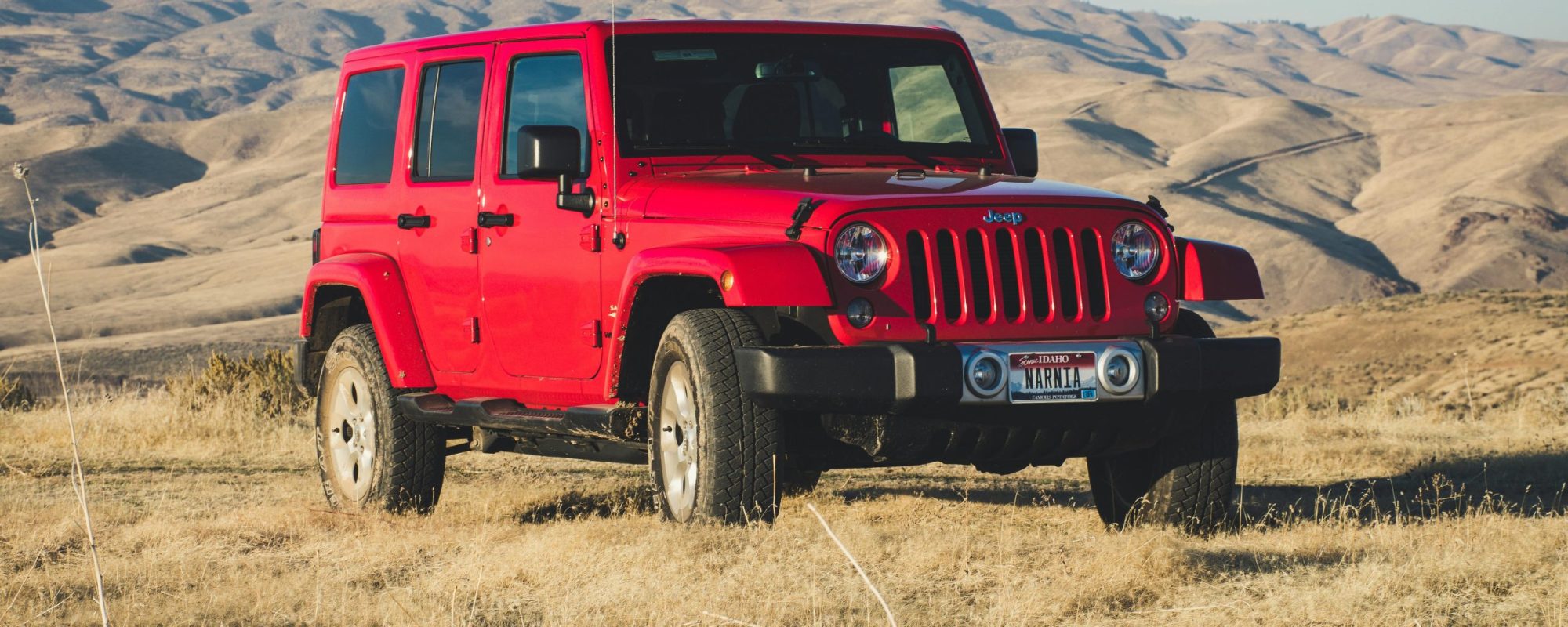 A striking red Jeep Wrangler by Brett Sayles. Jeep Wheel Spacers & Adapters