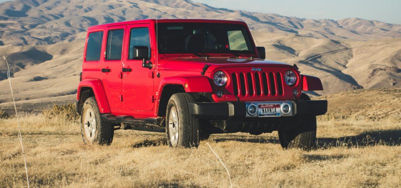 A striking red Jeep Wrangler by Brett Sayles. Jeep Wheel Spacers & Adapters