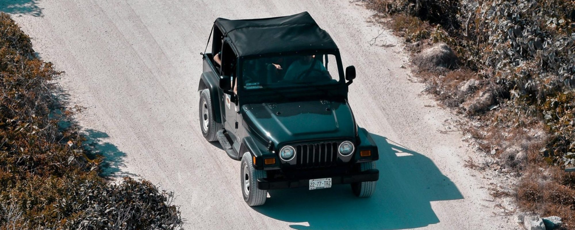 Aerial view of a Jeep Wrangler. by Roberto Archederra Jeep Wrangler wheel adapters / spacers