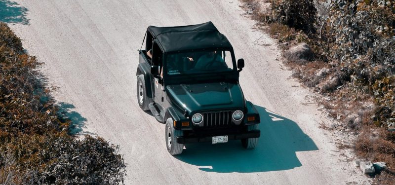 Aerial view of a Jeep Wrangler. by Roberto Archederra Jeep Wrangler wheel adapters / spacers