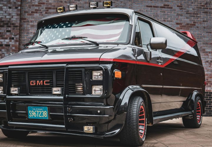Black Glossy GMC Vandura Van with American Flag by Sebastian Dziomba