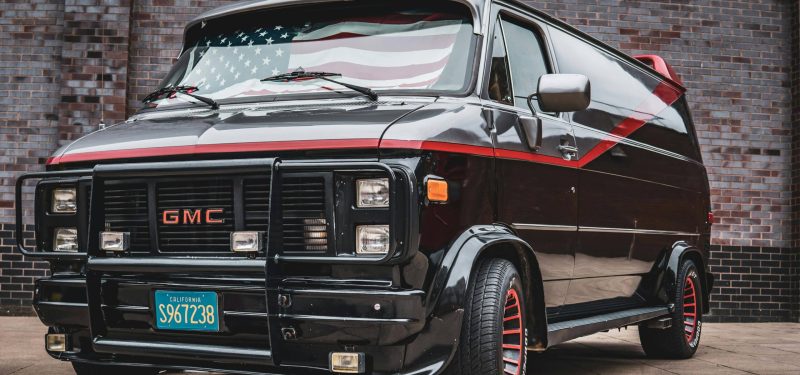 Black Glossy GMC Vandura Van with American Flag by Sebastian Dziomba