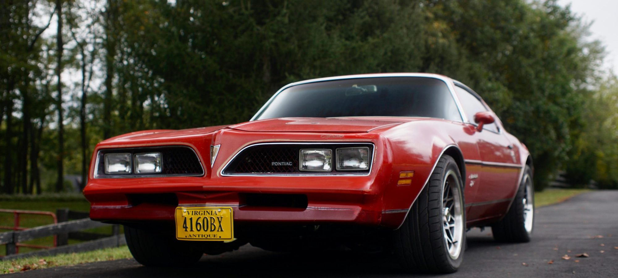 A vintage red Pontiac Firebird by Eric Joseph via pexels