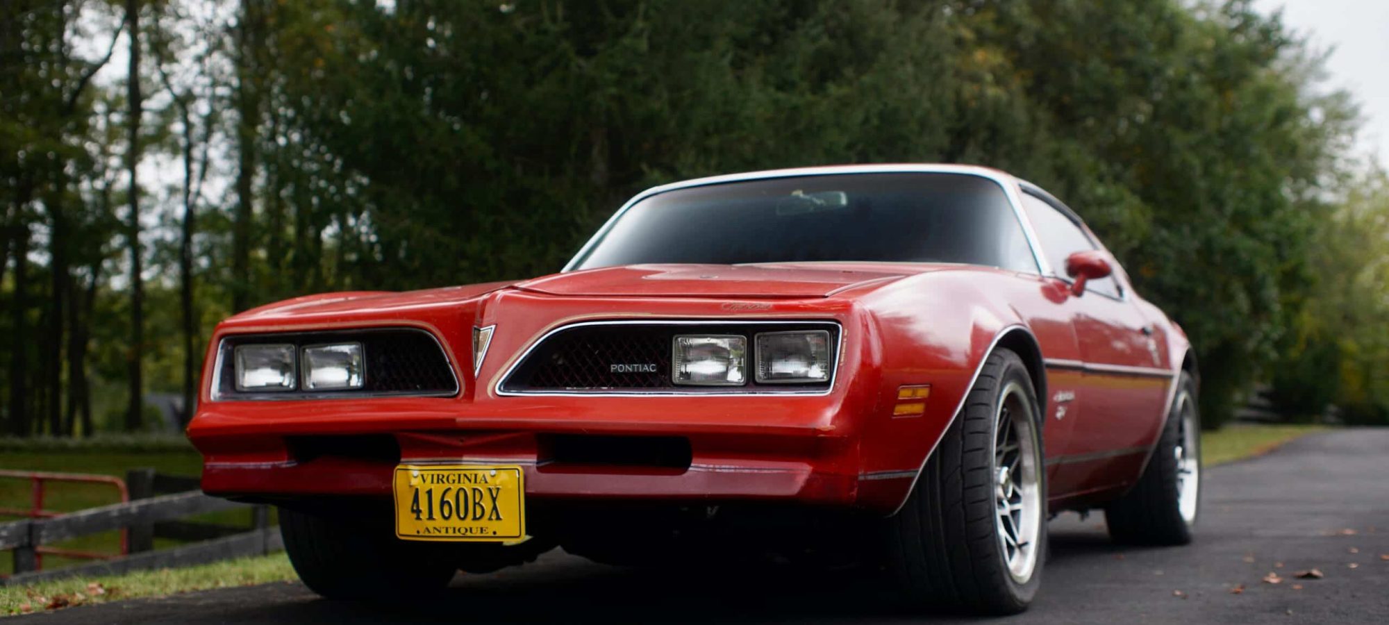 A vintage red Pontiac Firebird by Eric Joseph via pexels