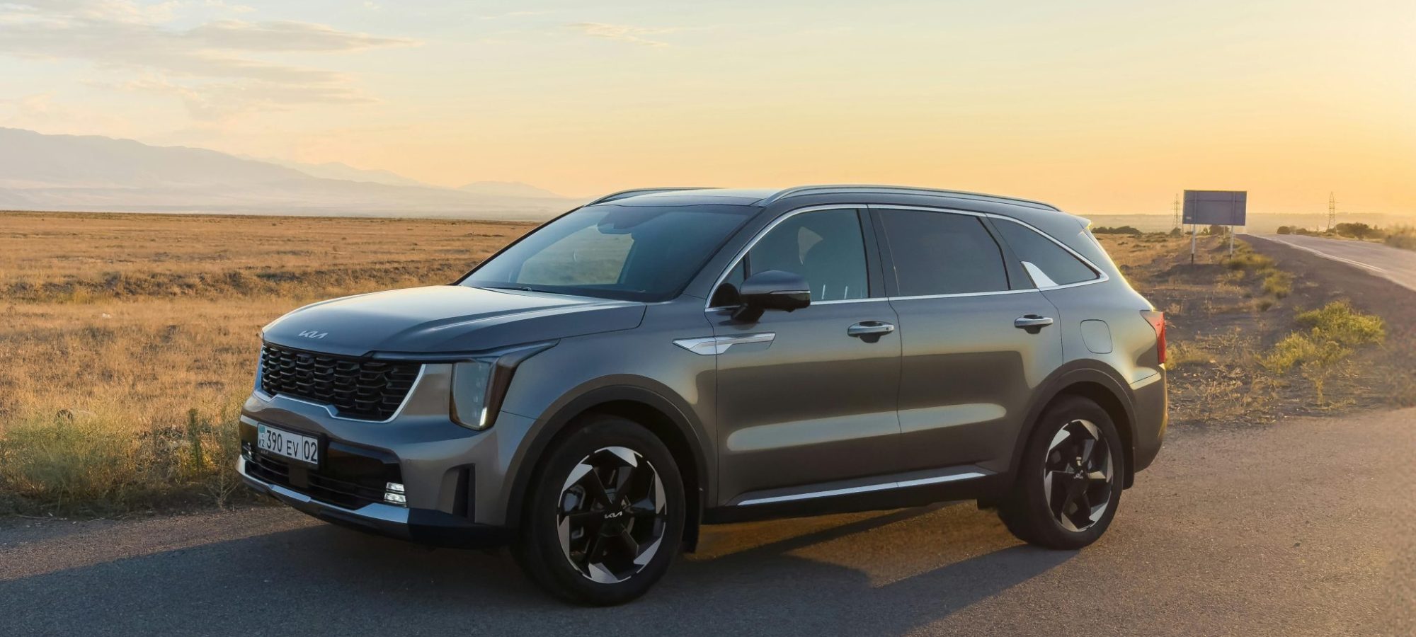 Sleek Kia SUV against a stunning sunset. Kia Wheel Spacers / Adapters