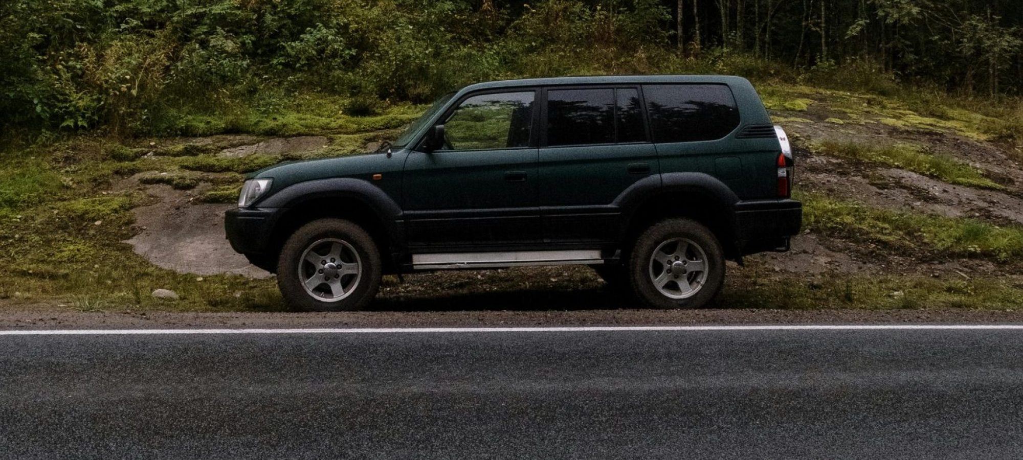 A lone SUV parked on a Land Rover Wheel Spacers / adapters. by cottonbro studio.