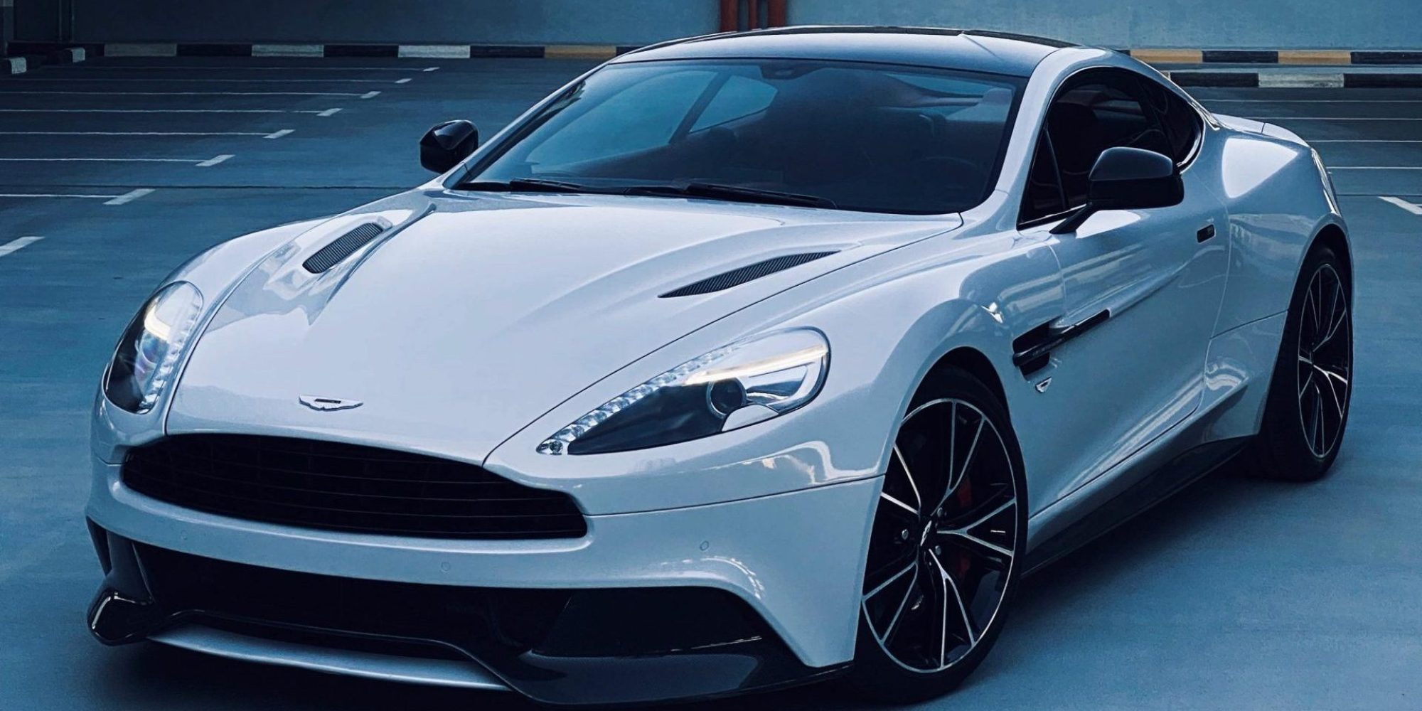 A sleek, white Aston Martin Vanquish. Aston Martin Wheel Spacers / Adapters
