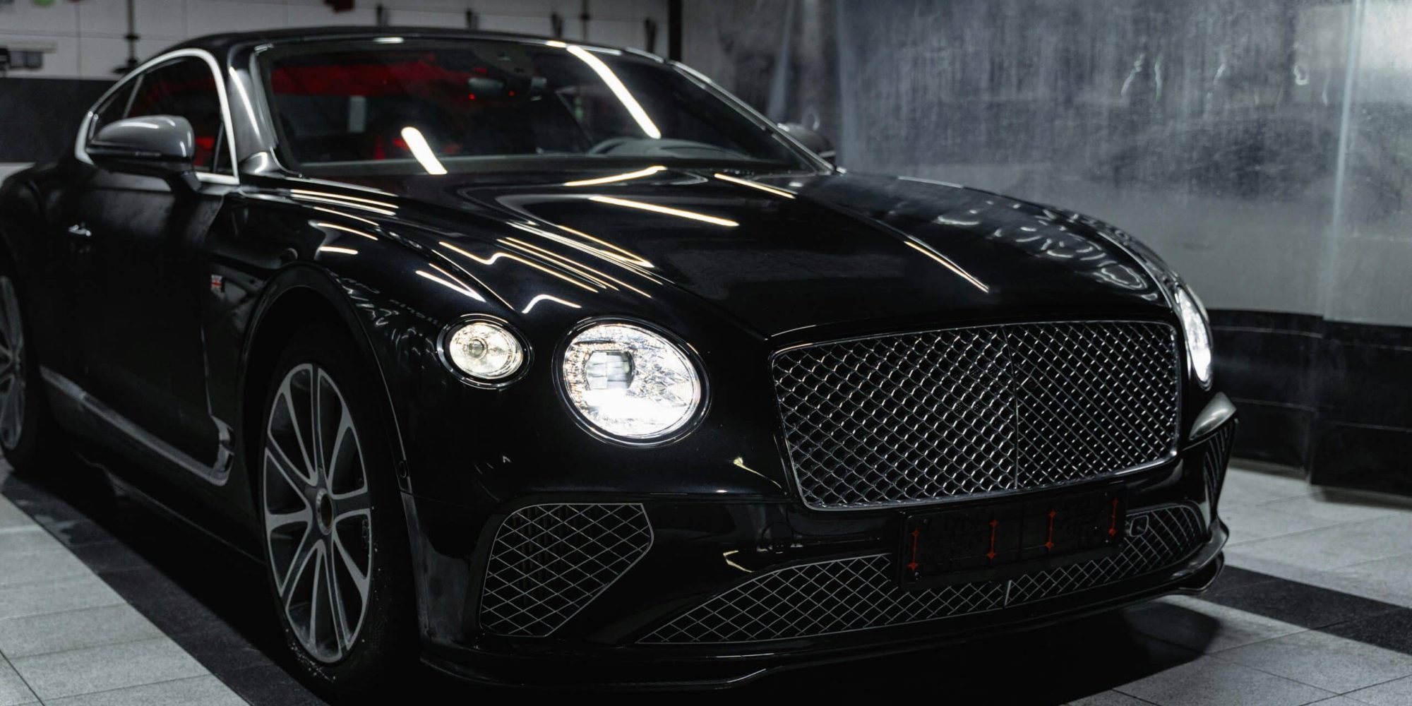 Sleek black Bentley. Bentley Wheel Spacers & Adapters