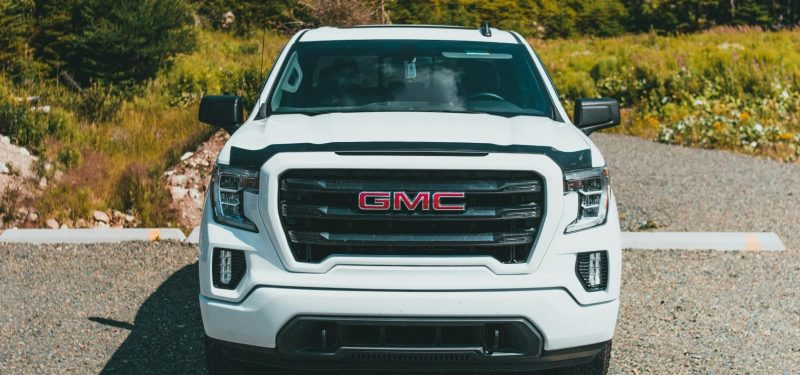 White Pickup Truck on Gray Concrete Road